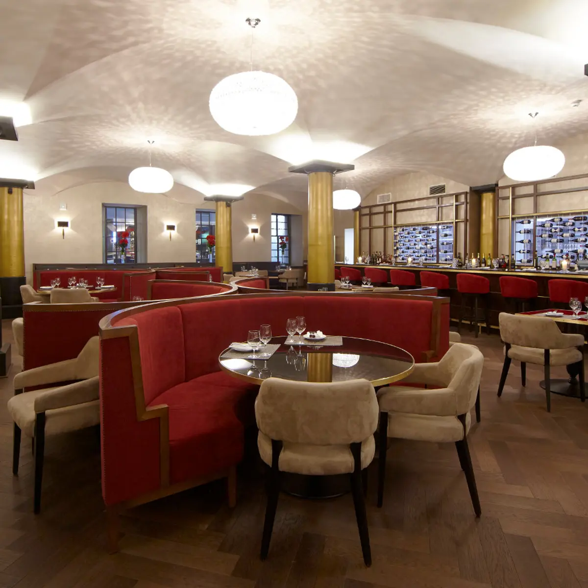 Grand wooden floor dining hall with cozy seating